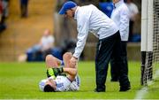 23 June 2019; Raymond Galligan of Cavan lies injured as a Umpire attends him during the Ulster GAA Football Senior Championship Final match between Donegal and Cavan at St Tiernach's Park in Clones, Monaghan. Photo by Oliver McVeigh/Sportsfile