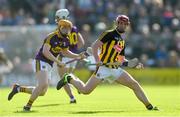 15 June 2019; Adrian Mullen of Kilkenny in action against Simon Donohoe of Wexford during the Leinster GAA Hurling Senior Championship Round 5 match between Wexford and Kilkenny at Innovate Wexford Park in Wexford. Photo by Piaras Ó Mídheach/Sportsfile
