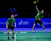 26 June 2019; Joshua Magee, right, and Paul Reynolds of Ireland in action against Kristjan Kaljurand and Paul Kasner of Estonia during their Men's Badminton Singles group stage match at Falcon Club on Day 6 of the Minsk 2019 2nd European Games in Minsk, Belarus. Photo by Seb Daly/Sportsfile