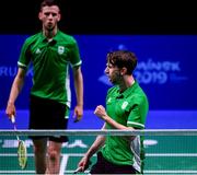 26 June 2019; Joshua Magee of Ireland, right, reacts after winning a point during the Men's Badminton Singles group stage match against Kristjan Kaljurand and Paul Kasner of Estonia at Falcon Club on Day 6 of the Minsk 2019 2nd European Games in Minsk, Belarus. Photo by Seb Daly/Sportsfile