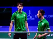 26 June 2019; Joshua Magee of Ireland, left, reacts after winning a point during the Men's Badminton Singles group stage match against Kristjan Kaljurand and Paul Kasner of Estonia at Falcon Club on Day 6 of the Minsk 2019 2nd European Games in Minsk, Belarus. Photo by Seb Daly/Sportsfile