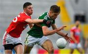 22 June 2019; Adrian Spillane of Kerry in action against Luke Connolly of Cork during the Munster GAA Football Senior Championship Final match between Cork and Kerry at Páirc Ui Chaoimh in Cork.  Photo by Brendan Moran/Sportsfile