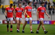 22 June 2019; Brian Hurley of Cork, 2nd from left, walks with team-mates Luke Connolly, Mark Collins and Tomás Clancy in the parade prior to the Munster GAA Football Senior Championship Final match between Cork and Kerry at Páirc Ui Chaoimh in Cork.  Photo by Brendan Moran/Sportsfile