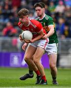 22 June 2019; Daniel Peet of Cork is tackled by Jack O'Connor of Kerry during the Electric Ireland Munster GAA Football Minor Championship Final match between Cork and Kerry at Páirc Ui Chaoimh in Cork.  Photo by Brendan Moran/Sportsfile