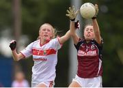 22 June 2019; Ava Trayers of Galway and Katie O'Driscoll of Cork during the Ladies Football All-Ireland U14 Platinum Final 2019 match between Cork and Galway at St Rynaghs in Banagher, Offaly. Photo by Ben McShane/Sportsfile