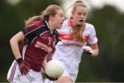 22 June 2019; Maryanne Jordan of Galway and Tara Hickey of Cork during the Ladies Football All-Ireland U14 Platinum Final 2019 match between Cork and Galway at St Rynaghs in Banagher, Offaly. Photo by Ben McShane/Sportsfile