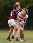 22 June 2019; Ciara O'Brien of Cork in action against Gráinne Molloy of Galway during the Ladies Football All-Ireland U14 Platinum Final 2019 match between Cork and Galway at St Rynaghs in Banagher, Offaly. Photo by Ben McShane/Sportsfile