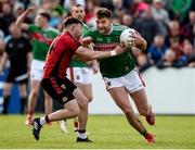 22 June 2019; Aidan O'Shea of Mayo in action against Donal O'Hare of Down  during the GAA Football All-Ireland Senior Championship Round 2 match between Down and Mayo at Pairc Esler in Newry, Down.  Photo by Oliver McVeigh/Sportsfile