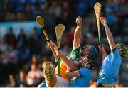 26 June 2019; Cillian Ryan of Offaly in action against Tommy Kinanne of Dublin during the Bord Gais Energy Leinster GAA Hurling U20 Championship quarter-final match between Dublin and Offaly at Parnell Park in Dublin. Photo by Eóin Noonan/Sportsfile