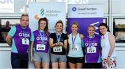 27 June 2019; Orla Cunningham, Rachel Dooley, Tracy O'Connell, and Nicola Gras of Qualtech, who finished 2nd in the Womens Team Race, are presented with their trophy by Aengus Burns of Grant Thornton and Karen Golden from Galway Simon Community after the Grant Thornton Corporate 5K Team Challenge Galway at Ballybrit Racecourse in Galway. Photo by Diarmuid Greene/Sportsfile