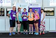 27 June 2019; Jackie Ryan, Aine Lydon, Julie Murphy, and Maretta O'Shea of Penn Engineering, who finished 3rd in the Womens Team Race, are presented with their trophy by Aengus Burns of Grant Thornton and Karen Golden from Galway Simon Community after the Grant Thornton Corporate 5K Team Challenge Galway at Ballybrit Racecourse in Galway. Photo by Diarmuid Greene/Sportsfile