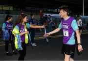 27 June 2019; David Dunne of Grant Thornton receives his medal after he crossed the finish line at the Grant Thornton Corporate 5K Team Challenge Galway at Ballybrit Racecourse in Galway. Photo by Diarmuid Greene/Sportsfile