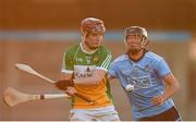 26 June 2019; Conor Quinn of Offaly in action against Pearse Christie of Dublin during the Bord Gais Energy Leinster GAA Hurling U20 Championship quarter-final match between Dublin and Offaly at Parnell Park in Dublin. Photo by Eóin Noonan/Sportsfile
