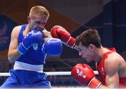 28 June 2019; Kurt Walker of Ireland, left, in action against Peter McGrail of Great Britain during their Men's Bantamweight semi-final bout at Minsk Arena Velodrome on Day 8 of the Minsk 2019 2nd European Games in Minsk, Belarus. Photo by Seb Daly/Sportsfile