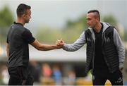 28 June 2019; Aaron McEneff of Shamrock Rovers with Robbie Benson of Dundalk, left, ahead of the SSE Airtricity League Premier Division match between Shamrock Rovers and Dundalk at Tallaght Stadium in Dublin. Photo by Eóin Noonan/Sportsfile