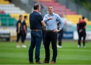 28 June 2019; Dundalk head coach Vinny Perth, right, speaking with Shamrock Rovers Chairman Jonathan Roche ahead of the SSE Airtricity League Premier Division match between Shamrock Rovers and Dundalk at Tallaght Stadium in Dublin. Photo by Eóin Noonan/Sportsfile