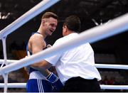 28 June 2019; Michael Nevin of Ireland is prevented from continuing by referee Wade Peterson following a knock-out by Salvatore Cavallaro of Italy during their Men's Middleweight semi-final bout at Minsk Arena Velodrome on Day 8 of the Minsk 2019 2nd European Games in Minsk, Belarus. Photo by Seb Daly/Sportsfile