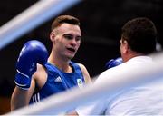 28 June 2019; Michael Nevin of Ireland is prevented from continuing by referee Wade Peterson following a knock-out by Salvatore Cavallaro of Italy during their Men's Middleweight semi-final bout at Minsk Arena Velodrome on Day 8 of the Minsk 2019 2nd European Games in Minsk, Belarus. Photo by Seb Daly/Sportsfile