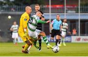 28 June 2019; Gary Rogers of Dundalk fouls Trevor Clarke of Shamrock Rovers, resulting in a yellow card, during the SSE Airtricity League Premier Division match between Shamrock Rovers and Dundalk at Tallaght Stadium in Dublin. Photo by Ben McShane/Sportsfile