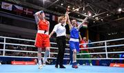 29 June 2019; Michaela Walsh of Ireland, left, reacts as referee Veronika Szucs raises the hand of Stanimira Petrova of Bulgaria after their Women’s Featherweight final bout at Uruchie Sports Palace on Day 9 of the Minsk 2019 2nd European Games in Minsk, Belarus. Photo by Seb Daly/Sportsfile