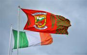 29 June 2019; A Mayo flag and an Irish tricolour fly in the wind prior to the GAA Football All-Ireland Senior Championship Round 3 match between Mayo and Armagh at Elverys MacHale Park in Castlebar, Mayo. Photo by Brendan Moran/Sportsfile