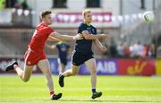 29 June 2019; Peter Kelly of Kildare in action against Brian Kennedy of Tyrone during the GAA Football All-Ireland Senior Championship Round 3 match between Kildare and Tyrone at St Conleth's Park in Newbridge, Co. Kildare. Photo by Ramsey Cardy/Sportsfile