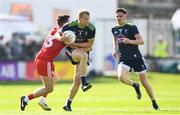 29 June 2019; Peter Kelly of Kildare is tackled by Darren McCurry of Tyrone during the GAA Football All-Ireland Senior Championship Round 3 match between Kildare and Tyrone at St Conleth's Park in Newbridge, Co. Kildare. Photo by Ramsey Cardy/Sportsfile