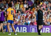 29 June 2019; Referee Martin McNally shows Cian O'Dea of Clare a yellow card during the GAA Football All-Ireland Senior Championship Round 3 match between Westmeath and Clare at TEG Cusack Park in Mullingar, Westmeath. Photo by Sam Barnes/Sportsfile