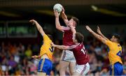 29 June 2019; Joe Halligan of Westmeath field a high ball despite the efforts of Cillian Brennan, left, and Gordon Kelly of Clare during the GAA Football All-Ireland Senior Championship Round 3 match between Westmeath and Clare at TEG Cusack Park in Mullingar, Westmeath. Photo by Sam Barnes/Sportsfile