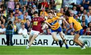 29 June 2019; Jack Smith of Westmeath in action against Sean O'Donoghue, left, and Cian O'Dea of Clare during the GAA Football All-Ireland Senior Championship Round 3 match between Westmeath and Clare at TEG Cusack Park in Mullingar, Westmeath. Photo by Sam Barnes/Sportsfile