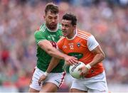 29 June 2019; Stefan Campbell of Armagh in action against Aidan O’Shea of Mayo during the GAA Football All-Ireland Senior Championship Round 3 match between Mayo and Armagh at Elverys MacHale Park in Castlebar, Mayo. Photo by Ben McShane/Sportsfile