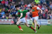 29 June 2019; Conor Loftus of Mayo is tackled by Mark Shields of Armagh during the GAA Football All-Ireland Senior Championship Round 3 match between Mayo and Armagh at Elverys MacHale Park in Castlebar, Mayo. Photo by Brendan Moran/Sportsfile