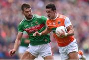 29 June 2019; Stefan Campbell of Armagh in action against Aidan O’Shea of Mayo during the GAA Football All-Ireland Senior Championship Round 3 match between Mayo and Armagh at Elverys MacHale Park in Castlebar, Mayo. Photo by Ben McShane/Sportsfile