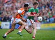 29 June 2019; Fionn McDonagh of Mayo in action against Jemar Hall of Armagh during the GAA Football All-Ireland Senior Championship Round 3 match between Mayo and Armagh at Elverys MacHale Park in Castlebar, Mayo. Photo by Brendan Moran/Sportsfile
