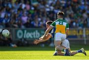 29 June 2019; Martin Scully of Laois in action against Eoin Carroll of Offaly during the GAA Football All-Ireland Senior Championship Round 3 match between Laois and Offaly at O'Moore Park in Portlaoise, Laois. Photo by Eóin Noonan/Sportsfile
