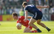 29 June 2019; Kieran McGeary of Tyrone in action against Tommy Moolick of Kildare during the GAA Football All-Ireland Senior Championship Round 3 match between Kildare and Tyrone at St Conleth's Park in Newbridge, Co. Kildare. Photo by Ramsey Cardy/Sportsfile