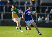 29 June 2019; Martin Scully of Laois in action against David Dempsey of Offaly during the GAA Football All-Ireland Senior Championship Round 3 match between Laois and Offaly at O'Moore Park in Portlaoise, Laois. Photo by Eóin Noonan/Sportsfile