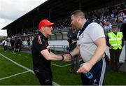 29 June 2019; Tyrone manager Mickey Harte, left, shakes hands with Kildare manager Cian O'Neill following the GAA Football All-Ireland Senior Championship Round 3 match between Kildare and Tyrone at St Conleth's Park in Newbridge, Co. Kildare. Photo by Ramsey Cardy/Sportsfile