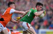 29 June 2019; Ciaran Tracey of Mayo is tackled by Aidan Nugent of Armagh during the GAA Football All-Ireland Senior Championship Round 3 match between Mayo and Armagh at Elverys MacHale Park in Castlebar, Mayo. Photo by Brendan Moran/Sportsfile