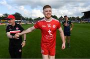 29 June 2019; Cathal McShane shakes hands with Tyrone manager Mickey Harte following the GAA Football All-Ireland Senior Championship Round 3 match between Kildare and Tyrone at St Conleth's Park in Newbridge, Co. Kildare. Photo by Ramsey Cardy/Sportsfile