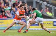 29 June 2019; Jarlath Óg Burns of Armagh in action against Mikey Murray of Mayo during the GAA Football All-Ireland Senior Championship Round 3 match between Mayo and Armagh at Elverys MacHale Park in Castlebar, Mayo. Photo by Ben McShane/Sportsfile