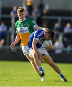 29 June 2019; Martin Scully of Laois in action against David Dempsey of Offaly during the GAA Football All-Ireland Senior Championship Round 3 match between Laois and Offaly at O'Moore Park in Portlaoise, Laois. Photo by Eóin Noonan/Sportsfile