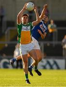 29 June 2019; Cathal Mangan of Offaly in action against Patrick O'Sullivan of Laois during the GAA Football All-Ireland Senior Championship Round 3 match between Laois and Offaly at O'Moore Park in Portlaoise, Laois. Photo by Eóin Noonan/Sportsfile