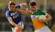 29 June 2019; Eoin Carroll of Offaly is tackled by Trevor Collins of Laois during the GAA Football All-Ireland Senior Championship Round 3 match between Laois and Offaly at O'Moore Park in Portlaoise, Laois. Photo by Eóin Noonan/Sportsfile