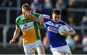 29 June 2019; Martin Scully of Laois in action against David Dempsey of Offaly during the GAA Football All-Ireland Senior Championship Round 3 match between Laois and Offaly at O'Moore Park in Portlaoise, Laois. Photo by Eóin Noonan/Sportsfile