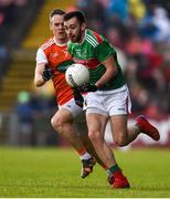 29 June 2019; Kevin McLoughlin of Mayo in action against Mark Shields of Armagh during the GAA Football All-Ireland Senior Championship Round 3 match between Mayo and Armagh at Elverys MacHale Park in Castlebar, Mayo. Photo by Ben McShane/Sportsfile