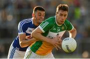 29 June 2019; Niiall McNamee of Offaly in action against Robert Pigott of Laois during the GAA Football All-Ireland Senior Championship Round 3 match between Laois and Offaly at O'Moore Park in Portlaoise, Laois. Photo by Eóin Noonan/Sportsfile