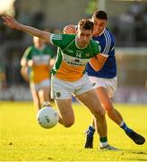 29 June 2019; Niiall McNamee of Offaly in action against Robert Pigott of Laois during the GAA Football All-Ireland Senior Championship Round 3 match between Laois and Offaly at O'Moore Park in Portlaoise, Laois. Photo by Eóin Noonan/Sportsfile