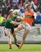 29 June 2019; Rian O'Neill of Armagh in action against Donal Vaughan of Mayo during the GAA Football All-Ireland Senior Championship Round 3 match between Mayo and Armagh at Elverys MacHale Park in Castlebar, Mayo. Photo by Brendan Moran/Sportsfile