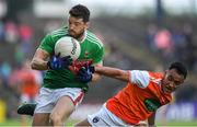 29 June 2019; Chris Barrett of Mayo is tackled by Jemar Hall of Armagh during the GAA Football All-Ireland Senior Championship Round 3 match between Mayo and Armagh at Elverys MacHale Park in Castlebar, Mayo. Photo by Brendan Moran/Sportsfile
